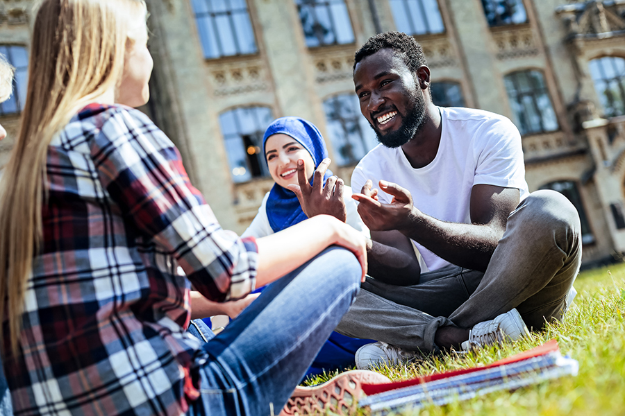 International Students Conversing in front of University